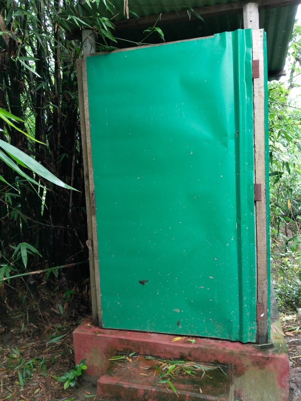 New green tin sanitary latrine.